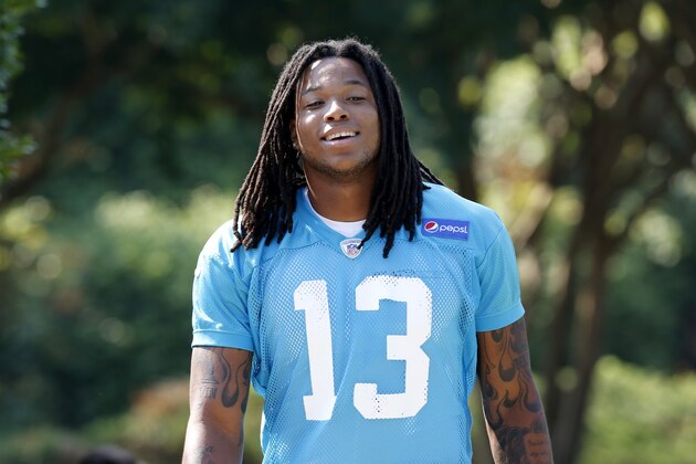 Carolina Panthers wide reciever Kelvin Benjamin walks to the practice field before an NFL football practice Wednesday, June 18, 2014 in Charlotte, N.C. (AP Photo/Nell Redmond)