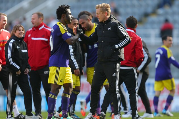 NEWCASTLE-UPON-TYNE, ENGLAND - APRIL 19:  Wilfried Bony of Swansea City celebrates with Swansea City manager Garry Monk at the end of the Barclays Premier League fixture between Newcastle United and Swansea City at St. James Park on April 19, 2014 in Newcastle-upon-Tyne, England. (Photo by Dave Thompson/Getty Images)