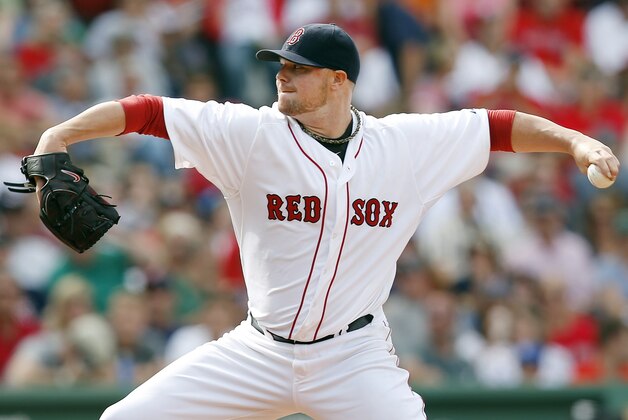 Boston Red Sox's Jon Lester pitches during the eighth inning of a baseball game against the Kansas City Royals in Boston, Sunday, July 20, 2014. (AP Photo/Michael Dwyer)