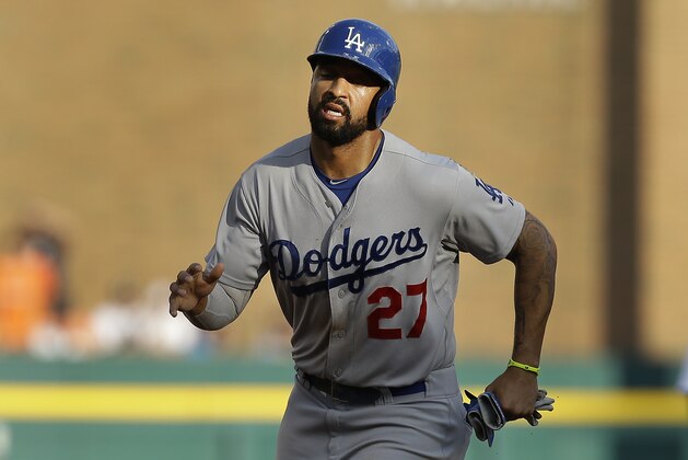 Los Angeles Dodgers' Matt Kemp runs the bases  against the Detroit Tigers in the first inning of a baseball game in Detroit, Tuesday, July 8, 2014. (AP Photo/Paul Sancya)