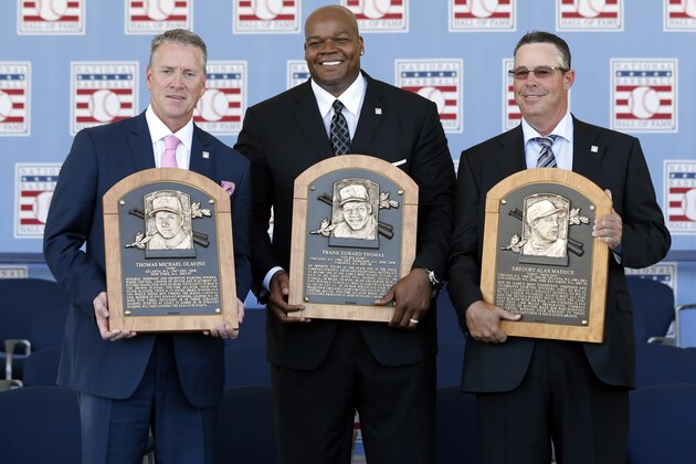 National Baseball Hall of Fame inductees Tom Glavine, Frank Thomas and Greg Maddux hold their plaques after an induction ceremony at the Clark Sports Center on Sunday, July 27, 2014, in Cooperstown, N.Y. (AP Photo/Mike Groll)