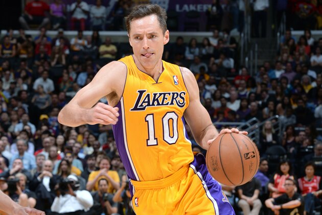 LOS ANGELES, CA - APRIL 8: Steve Nash #10 of the Los Angeles Lakers handles the ball against the Houston Rockets at Staples Center on April 8, 2014 in Los Angeles, California. NOTE TO USER: User expressly acknowledges and agrees that, by downloading and/or using this Photograph, user is consenting to the terms and conditions of the Getty Images License Agreement. Mandatory Copyright Notice: Copyright 2014 NBAE (Photo by Noah Graham/NBAE via Getty Images)