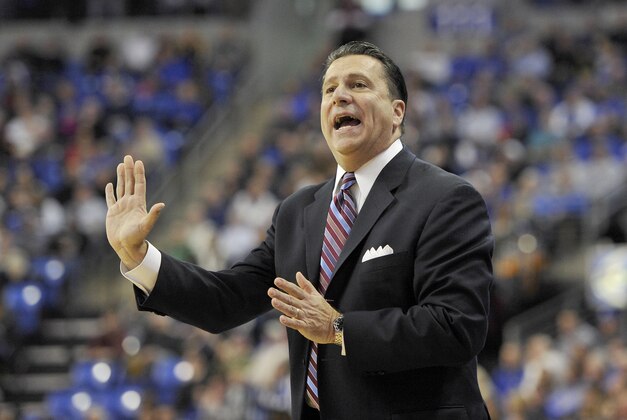 Jan 18, 2014; St. Louis, MO, USA; Fordham Rams head coach Tom Pecora calls a play from the bench against the Saint Louis Billikens during the first half at Chaifetz Arena. Mandatory Credit: Jasen Vinlove-USA TODAY Sports