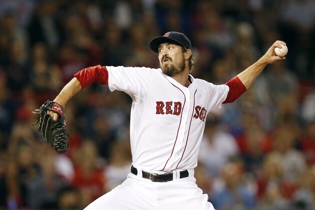 Boston Red Sox's Andrew Miller pitches during the eighth inning of a baseball game against the Kansas City Royals in Boston, Saturday, July 19, 2014. (AP Photo/Michael Dwyer)