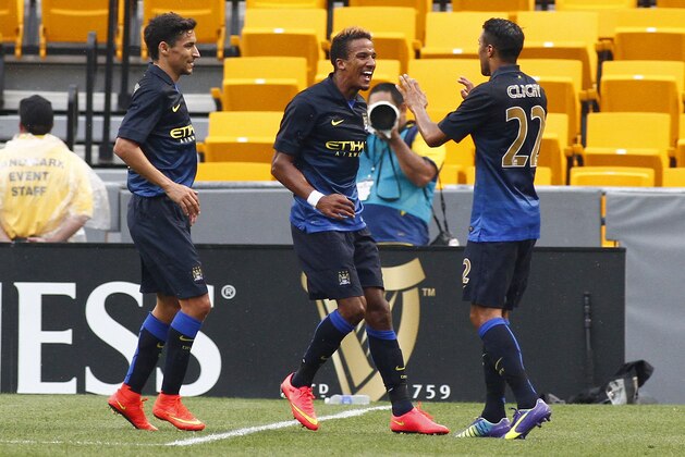 PITTSBURGH, PA - JULY 27:  Scott Sinclair #12 of Manchester City celebrates with teammates after scoring in the first half against AC Milan during International Champions Cup 2014 at Heinz Field on July 27, 2014 in Pittsburgh, Pennsylvania.  (Photo by Justin K. Aller/Getty Images)