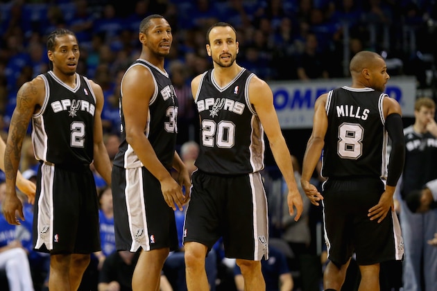 OKLAHOMA CITY, OK - MAY 25: Aron Baynes #16, Kawhi Leonard #2, Boris Diaw #33, Manu Ginobili #20 and Patty Mills #8 of the San Antonio Spurs look on in the second quarter against the Oklahoma City Thunder during Game Three of the Western Conference Finals of the 2014 NBA Playoffs at Chesapeake Energy Arena on May 25, 2014 in Oklahoma City, Oklahoma.  (Photo by Ronald Martinez/Getty Images)