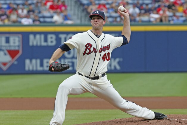 Atlanta Braves works pitcher Alex Wood (40) works in the first inning of a baseball game against the Philadelphia Phillies  in Atlanta, Sunday, July 20, 2014.(AP Photo/John Bazemore)