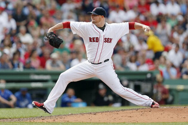 Boston Red Sox's Jon Lester pitches during the eighth inning of a baseball game against the Kansas City Royals in Boston, Sunday, July 20, 2014. (AP Photo/Michael Dwyer)