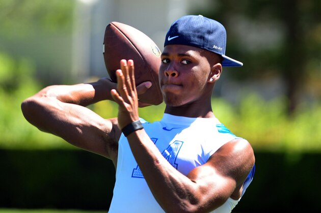 Jul 10, 2014; Beaverton, OR, USA; Land Shark quarterback Deondre Francois (14) passes the ball as he warms up during Nike Football ' The Opening' at Nike World Headquarters.  Mandatory Credit: Steve Dykes-USA TODAY Sports