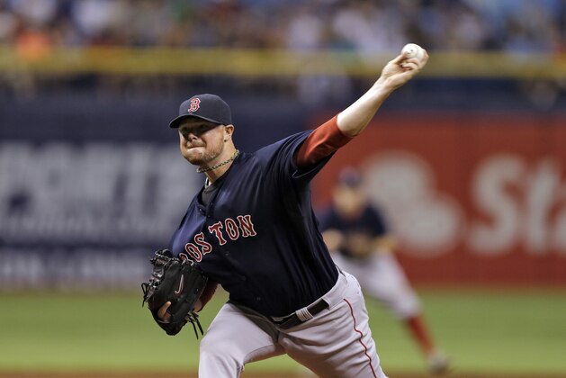 Boston Red Sox starting pitcher Jon Lester during the first inning of a baseball game against the Tampa Bay Rays Friday, July 25, 2014, in St. Petersburg, Fla. (AP Photo/Chris O'Meara)
