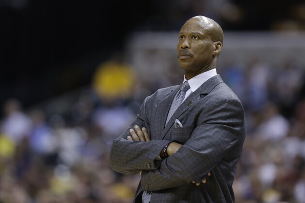 FILE - In this April 9, 2013, file photo, then-Cleveland Cavaliers coach Byron Scott watches the Cavaliers' NBA basketball game against the Indiana Pacers in Indianapolis. Scott said this weekend that he has been hired by the Lakers, but the club insisted Sunday, July 27, 2014, that no deal has been reached. Scott, who won three NBA titles as a shooting guard for the Lakers, told KCBS-TV he will take over the club, which hasn't had a coach since Mike D'Antoni resigned April 30. (AP Photo/Michael Conroy,file)