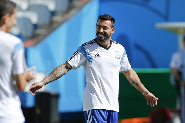 Argentina's Ezequiel Lavezzi gestures during a training session at Itaquerao Stadium in Sao Paulo, Brazil, Monday, June 30, 2014. On Tuesday, Argentina will face Switzerland in their next World Cup soccer match.  (AP Photo/Victor R. Caivano)