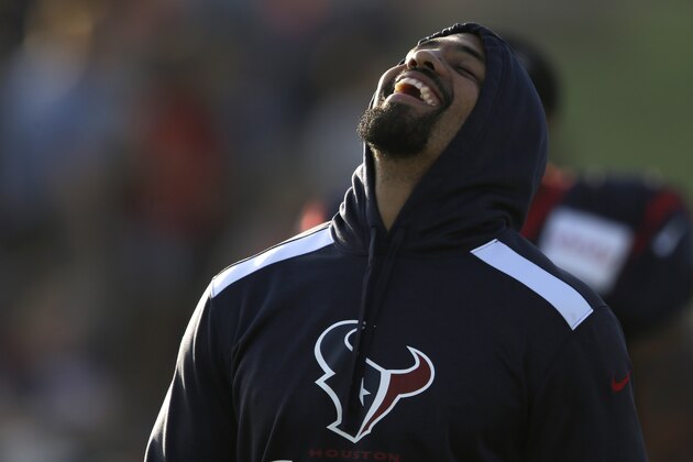 Houston Texans running back Arian Foster laughs during NFL football training camp Monday, July 28, 2014, in Houston. (AP Photo/Pat Sullivan)
