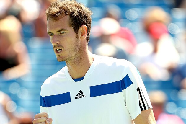 CINCINNATI, OH - AUGUST 14:  Andy Murray of Great Britain celebrates a point against Mikhail Youzhny of Russia during the Western & Southern Open on August 14, 2013 at Lindner Family Tennis Center in Cincinnati, Ohio.  (Photo by Matthew Stockman/Getty Images)