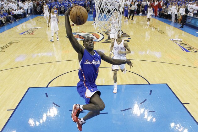 Los Angeles Clippers guard Darren Collison (2) shoots in front of Oklahoma City Thunder guard Jeremy Lamb (11) in the fourth quarter of Game 2 of the Western Conference semifinal NBA basketball playoff series in Oklahoma City, Thursday, May 8, 2014. Oklahoma City won 112-101. (AP Photo/Sue Ogrocki)