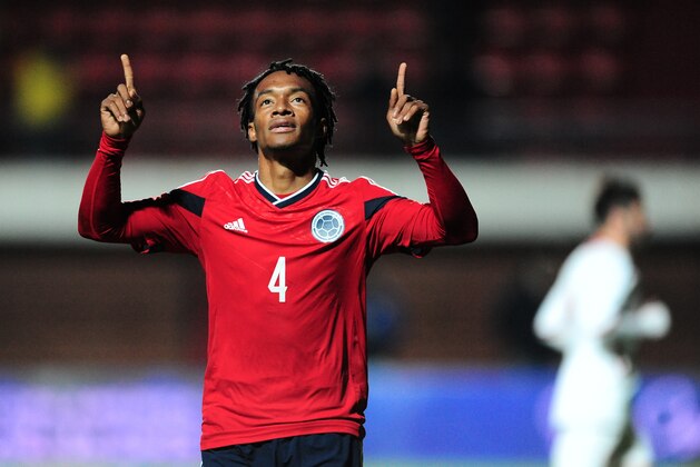 BUENOS AIRES, ARGENTINA - JUNE 06: Juan Cuadrado of Colombia celebrates after shooting a penalty kick to score the second goal during the International Friendly Match between Colombia and Jordan at Pedro Bidegain Stadium on June 06, 2014 in Buenos Aires, Argentina. (Photo by Alfredo Herms/Getty Images)