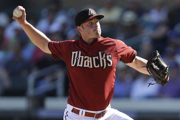 SCOTTSDALE, AZ - FEBRUARY 26: Addison Reed #43 of the Arizona Diamondbacks pitching during the game against the Los Angeles Dodgers at Salt River Fields at Talking Stick on February 26, 2014 in Scottsdale, Arizona. (Photo by Mike McGinnis/Getty Images)