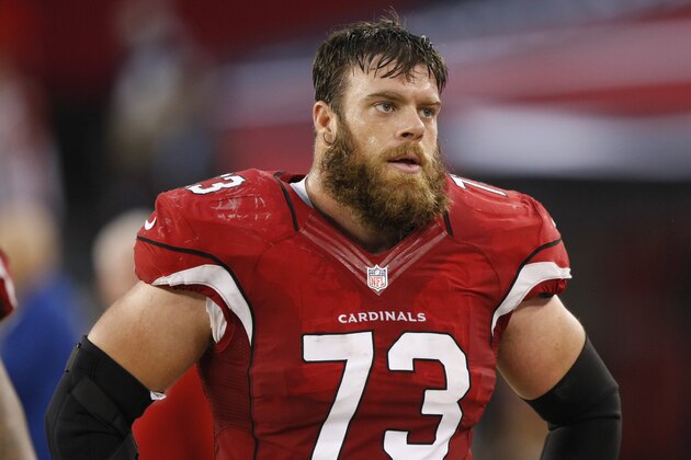 FILE - In this Nov. 24, 2013 file photo, Arizona Cardinals tackle Eric Winston (73) watches from the sideline during the fist quarter of an NFL football game against the Indianapolis Colts, in Glendale, Ariz. Winston has been elected president of the NFL players union. Winston succeeds Domonique Foxworth, who did not seek re-election for the NFL Players Association post. (AP Photo/Rick Scuteri, File)