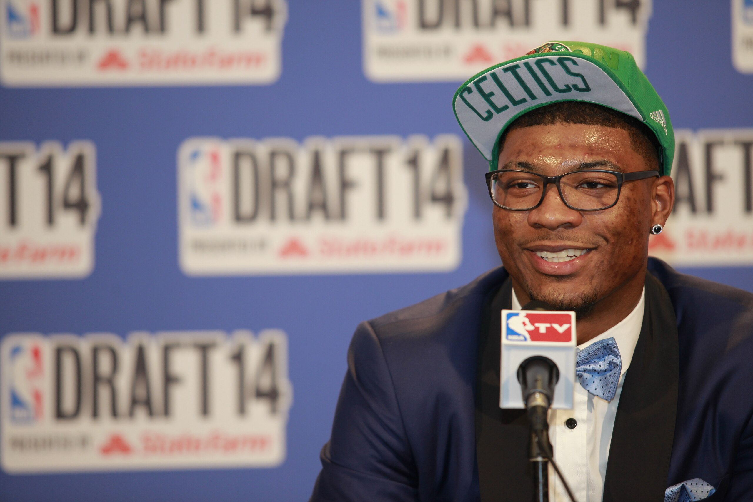 NEW YORK - JUNE 26: Marcus Smart addresses the media after being selected 6th overall by the Boston Celtics during the 2014 NBA Draft on June 26, 2014 at the Barclays Center in Brooklyn, New York. NOTE TO USER: User expressly acknowledges and agrees that, by downloading and/or using this photograph, user is consenting to the terms and conditions of the Getty Images License Agreement.  Mandatory Copyright Notice: Copyright 2014 NBAE (Photo by Jeyhoun Allebaugh/NBAE via Getty Images)