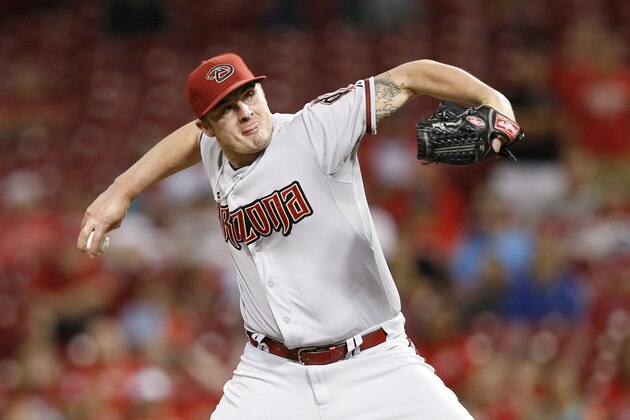 CINCINNATI, OH - JULY 28: Addison Reed #43 of the Arizona Diamondbacks pitches in the 15th inning of the game against the Cincinnati Reds at Great American Ball Park on July 28, 2014 in Cincinnati, Ohio. The Diamondbacks won 2-1 in 15 innings. (Photo by Joe Robbins/Getty Images) CINCINNATI, OH - JULY 28: Addison Reed #43 of the Arizona Diamondbacks pitches in the 15th inning of the game against the Cincinnati Reds at Great American Ball Park on July 28, 2014 in Cincinnati, Ohio. The Diamondbacks won 2-1 in 15 innings. (Photo by Joe Robbins/Getty Images)