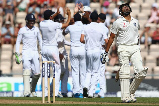 SOUTHAMPTON, ENGLAND - JULY 29: Rohit Sharma (R) of India shows his frustration after being caught by Stuart Broad off the bowling of Moeen Ali of England during day three of the 3rd Investec Test match between England and India at the Ageas Bowl at Ageas Bowl on July 29, 2014 in Southampton, England.  (Photo by Michael Steele/Getty Images)