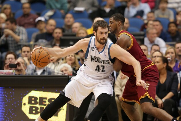 MINNEAPOLIS, MN - NOVEMBER 13:  Kevin Love #42 of the Minnesota Timberwolves drives to the basket against the Cleveland Cavaliers on November 13, 2013 at Target Center in Minneapolis, Minnesota. NOTE TO USER: User expressly acknowledges and agrees that, by downloading and or using this Photograph, user is consenting to the terms and conditions of the Getty Images License Agreement. Mandatory Copyright Notice: Copyright 2013 NBAE (Photo by Jordan Johnson/NBAE via Getty Images)