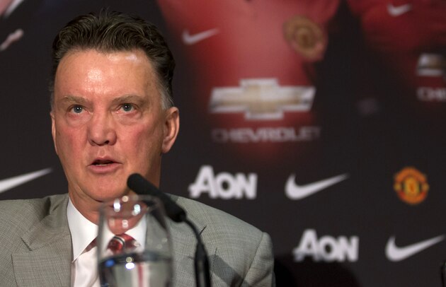 Manchester United's new manager Louis van Gaal speaks during a press conference at Old Trafford Stadium, Manchester, England, Thursday July 17, 2014. The new manager takes over after recently guiding Holland to third place at the 2014 World Cup. (AP Photo/Jon Super)