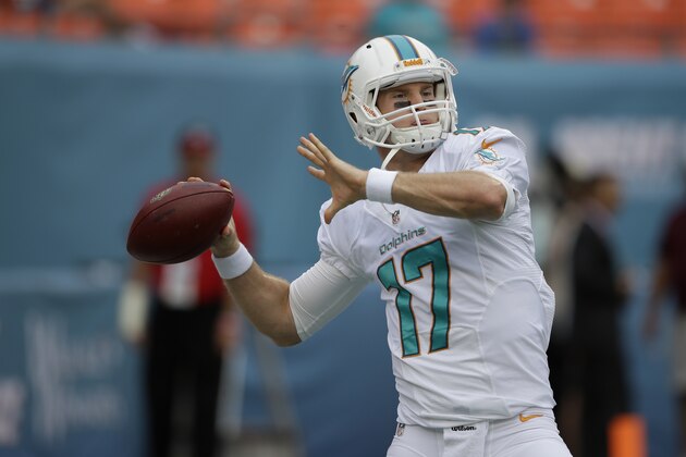 Miami Dolphins quarterback Ryan Tannehill (17) throws the football during team warm-ups before an NFL football game against the New York Jets, Sunday, Dec. 29, 2013, in Miami Gardens, Fla. (AP Photo/Lynne Sladky)