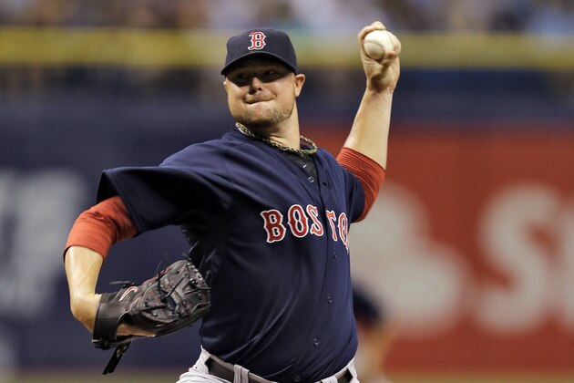 Boston Red Sox starting pitcher Jon Lester delivers to the Tampa Bay Rays during the first inning of a baseball game Friday, July 25, 2014, in St. Petersburg, Fla. (AP Photo/Chris O'Meara) Boston Red Sox starting pitcher Jon Lester delivers to the Tampa Bay Rays during the first inning of a baseball game Friday, July 25, 2014, in St. Petersburg, Fla. (AP Photo/Chris O'Meara)