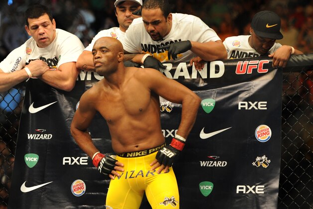 Jul 6, 2013; Las Vegas, NV, USA;  Anderson Silva (yellow shorts) is introduced for his Middleweight Chamionship Bout at the MGM Grand Garden Arena. Chris Weidman defeated Anderson in a TKO in the second round. Mandatory Credit: Jayne Kamin-Oncea-USA TODAY Sports