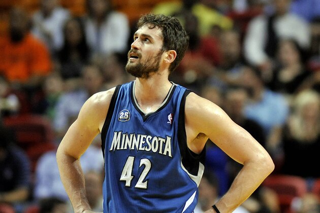 Apr 4, 2014; Miami, FL, USA; Minnesota Timberwolves forward Kevin Love (42) takes a breather during the first half against the Miami Heat at American Airlines Arena. Mandatory Credit: Steve Mitchell-USA TODAY Sports