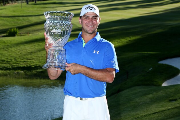 RENO, NV - AUGUST 04:  Gary Woodland poses with the trophy after his victory during the final round of the Reno-Tahoe Open at Montreaux Golf and Country Club on August 4, 2013 in Reno, Nevada.  (Photo by Stephen Dunn/Getty Images)