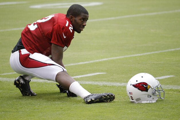 Arizona Cardinals' John Brown stretches during an NFL football training camp, Tuesday, July 29, 2014, in Glendale, Ariz. (AP Photo/Matt York)