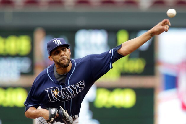 Tampa Bay Rays starting pitcher David Price throws against the Minnesota Twins in the first inning of a baseball game, Saturday, July 19, 2014, in Minneapolis. (AP Photo/Jim Mone)