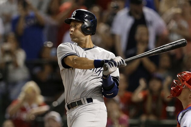 New York Yankees' Derek Jeter follows through on an infield ground out in the ninth inning of a baseball game against the Texas Rangers, Monday, July 28, 2014, in Arlington, Texas. Jeter had three hits, to pass Carl Yastrzemski on the hits list, in the 4-2 Rangers win. (AP Photo/Tony Gutierrez)