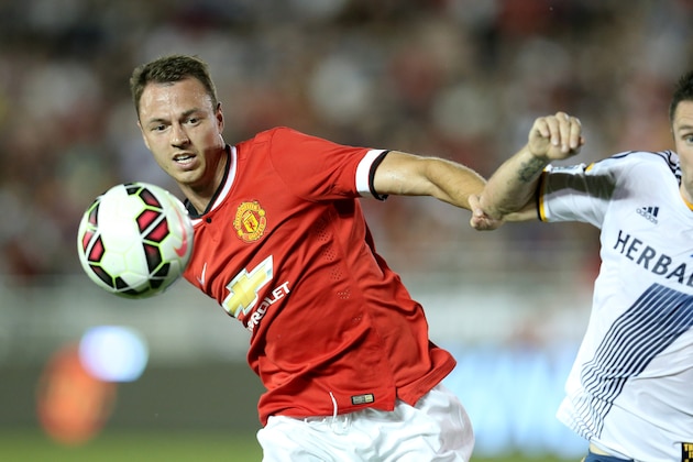 PASADENA, CA - JULY 23:  Jonny Evans #6 of Manchester United fights for the ball with Robbie Keane #7 of the Los Angeles Galaxy at the Rose Bowl on July 23, 2014 in Pasadena, California.  (Photo by Stephen Dunn/Getty Images)