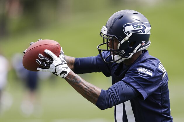 Seattle Seahawks rookie wide receiver Paul Richardson makes a catch, Friday, May 16, 2014, during an NFL football rookie minicamp in Renton, Wash. (AP Photo/Ted S. Warren)