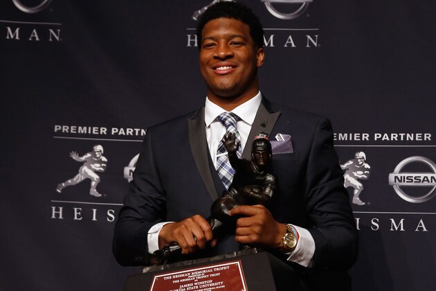NEW YORK, NY - DECEMBER 14:  Jameis Winston, quarterback of the Florida State Seminoles, poses with the trophy during a press conference after the 2013 Heisman Trophy Presentation at the Marriott Marquis on December 14, 2013 in New York City.  (Photo by Jeff Zelevansky/Getty Images)