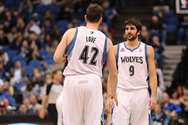 MINNEAPOLIS, MN - April 16:   Kevin Love #42 and Ricky Rubio #9 of the Minnesota Timberwolves talk against the Utah Jazz on April 16, 2014 at Target Center in Minneapolis, Minnesota. NOTE TO USER: User expressly acknowledges and agrees that, by downloading and or using this Photograph, user is consenting to the terms and conditions of the Getty Images License Agreement. Mandatory Copyright Notice: Copyright 2014 NBAE (Photo by Jordan Johnson/NBAE via Getty Images)