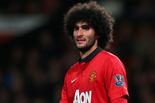 MANCHESTER, ENGLAND - MAY 06:  Marouane Fellaini of Manchester United looks on during the Barclays Premier League match between Manchester United and Hull City at Old Trafford on May 6, 2014 in Manchester, England.  (Photo by Alex Livesey/Getty Images)