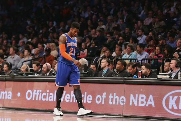 NEW YORK, NY - APRIL 15: Iman Shumpert #21 of the New York Knicks leaves the court during the fourth quarter against the Brooklyn Nets at the Barclays Center on April 15, 2014 in the Brooklyn borough of New York City. NOTE TO USER: User expressly acknowledges and agrees that, by downloading and/or using this Photograph, user is consenting to the terms and conditions of the Getty Images License Agreement.  (Photo by Bruce Bennett/Getty Images)