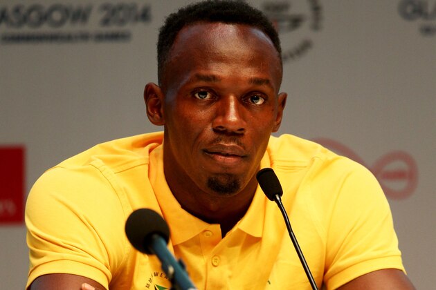 GLASGOW, SCOTLAND - JULY 26:  Athlete Usain Bolt of Jamaica attends a press conference and photocall at the Main Press Centre (MPC) during day three of the Glasgow 2014 Commonwealth Games on July 26, 2014 in Glasgow, United Kingdom.  (Photo by Cameron Spencer/Getty Images)