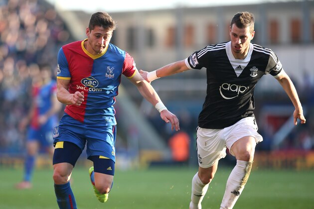 LONDON, ENGLAND - MARCH 08:  Joel Ward of Palace gets away from Morgan Schneiderlin of Southampton during the Barclays Premier League match between Crystal Palace and Southampton at Selhurst Park on March 08, 2014 in London, England. (Photo by Charlie Crowhurst/Getty Images)