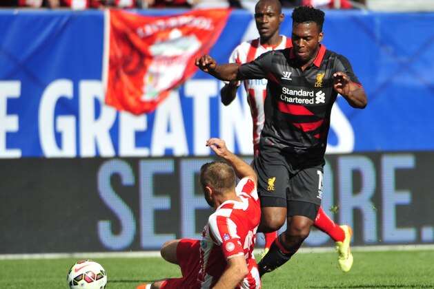 CHICAGO, IL - JULY 27: Dimitris Siovas #23 of Olympiacos FC defends Daniel Sturridge #15 of Liverpool during the International Champions Cup 2014 on July 27, 2014 at Soldier Field in Chicago, Illinois.  (Photo by David Banks/Getty Images)