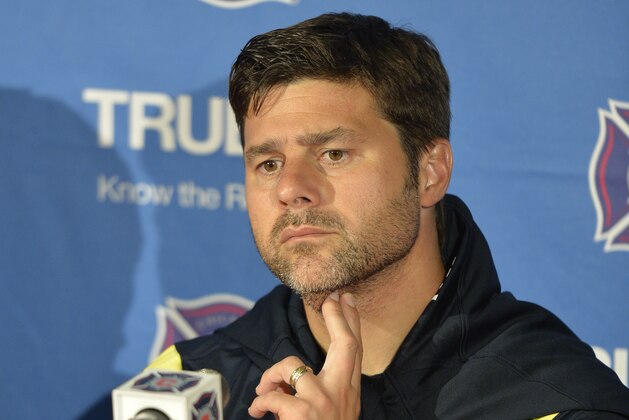 BRIDGEVIEW, IL - JULY 26:  Manager Mauricio Pochettino of Tottenham Hotspur speaks during a news conference after the game against the Chicago Fire at Toyota Park on July 26, 2014 in Bridgeview, Illinois. Tottenham Hotspur defeated the Fire 2-0.  (Photo by Brian Kersey/Getty Images)