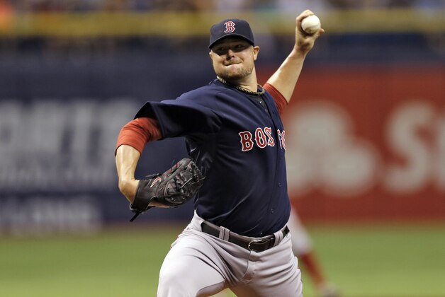 Boston Red Sox starting pitcher Jon Lester delayers to the Tampa Bay Rays during the first inning of a baseball game Friday, July 25, 2014, in St. Petersburg, Fla. (AP Photo/Chris O'Meara) Boston Red Sox starting pitcher Jon Lester delayers to the Tampa Bay Rays during the first inning of a baseball game Friday, July 25, 2014, in St. Petersburg, Fla. (AP Photo/Chris O'Meara)