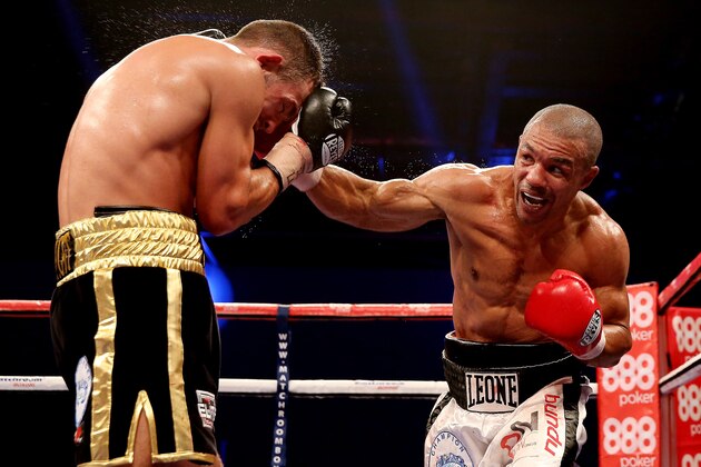 LONDON, ENGLAND - DECEMBER 14:  Leonard Bundu (R) in action with Lee Purdy during their European Welterweight Title bout at ExCel on December 14, 2013 in London, England.  (Photo by Scott Heavey/Getty Images)