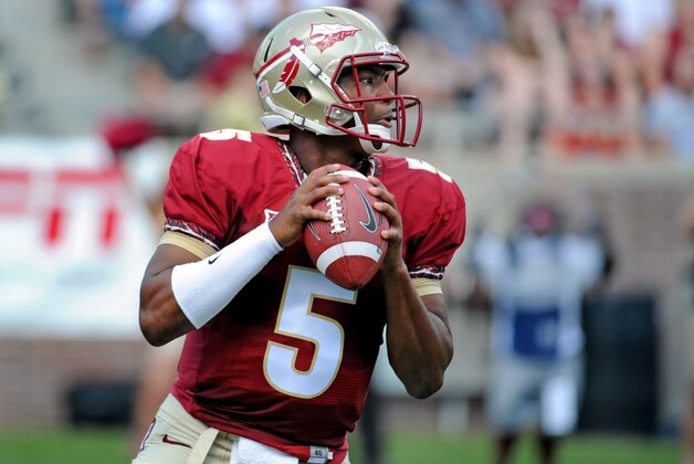 Apr 12, 2014; Tallahassee, FL, USA; Florida State Seminoles quarterback Jameis Winston (5) looks to throw the ball during the spring game at Doak Campbell Stadium. Mandatory Credit: Melina Vastola-USA TODAY Sports