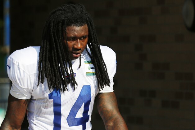 Buffalo Bills wide receiver Sammy Watkins (14) walks onto the field at their NFL football training camp in Pittsford, N.Y., Tuesday, July 22, 2014. (AP Photo/Bill Wippert)
