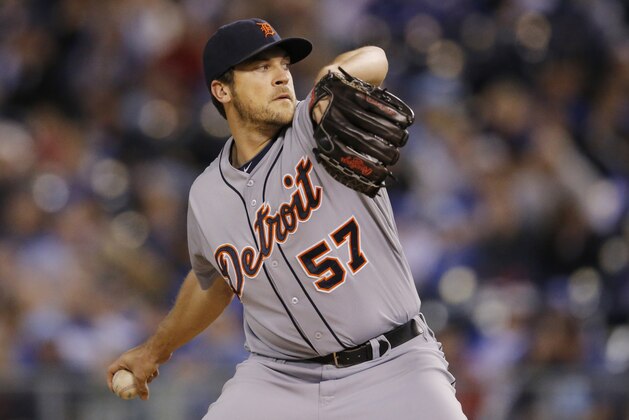 Detroit Tigers relief pitcher Evan Reed (57) during a baseball game against the Kansas City Royals at Kauffman Stadium in Kansas City, Mo., Friday, May 2, 2014. The Detroit Tigers defeated the Kansas City Royals 8-2. (AP Photo/Orlin Wagner)